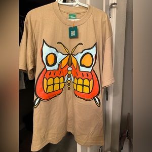 T Shirt , Brand new in bag. Bought by mistake and they don’t accept returns